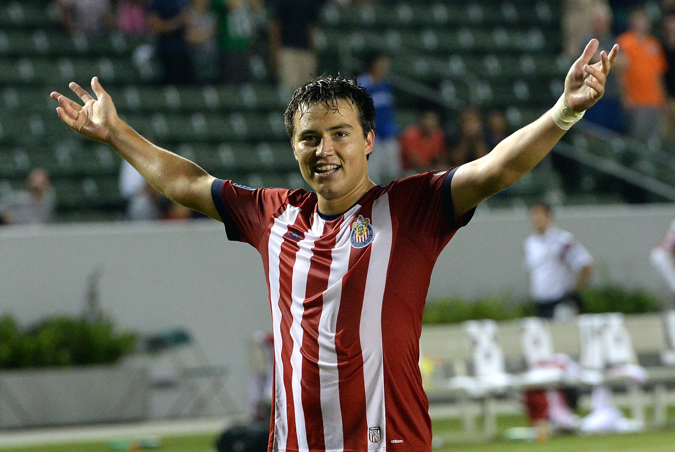 Jul 5, 2014; Carson, CA, USA; Chivas USA forward Erick Torres (9) raises his arms to the crowd celebrating his goal that won the game in extra time against the Montreal Impact at StubHub Center. Mandatory Credit: Jayne Kamin-Oncea-USA TODAY Sports