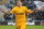 Verona's Juan Manuel Iturbe  celebrates after scoring, during a Serie A soccer match between Udinese and Verona at the Friuli Stadium in Udine, Italy, Monday, Jan. 6, 2014. (AP Photo/Paolo Giovannini)