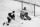 Boston Bruins' Ken Hodge flips puck past New York Rangers' goalie Terry Sawchuk in third period of their NHL playoff game at Boston Garden, April 10, 1970.  Boston won 5-3 to lead the Stanley Cup East Division semifinal playoffs 2-0. (AP Photo/A.E. Maloof)