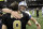 New Orleans Saints quarterback Drew Brees (9) hugs Detroit Lions quarterback Matthew Stafford (9) after their NFL football game in New Orleans, Sunday, Dec. 4, 2011. The Saints won 31-17. (AP Photo/Bill Haber)