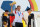 Germany's  Philipp Lahm  lifts the trophy at the  the arrival of the German national soccer team from Brazil  at Tegel airport in Berlin, Tuesday July 15, 2014.   Germany beat Argentina 1-0 on Sunday to win its fourth World Cup title. (AP Photo/ Karina Hessland,pool)