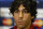 Atletico's Tiago Mendes listens during a press conference at Stamford Bridge stadium in London, Tuesday, April 29, 2014. Chelsea will play in a Champions League semifinal second leg soccer match against Atletico Madrid on Wednesday. (AP Photo/Kirsty Wigglesworth)