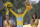 2014 Tour de France cycling race winner Italy's Vincenzo Nibali, wearing the overall leader's yellow jersey, celebrates on the podium in Paris, France, Sunday, July 27, 2014. (AP Photo/Christophe Ena)