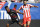 Liverpool FC forward Daniel Sturridge, left, controls the ball against Olympiacos defender Dimitris Siovas (23) during the first half of a Guinness International Champions Cup soccer match in Chicago, Sunday, July 27, 2014. (AP Photo/Nam Y. Huh)