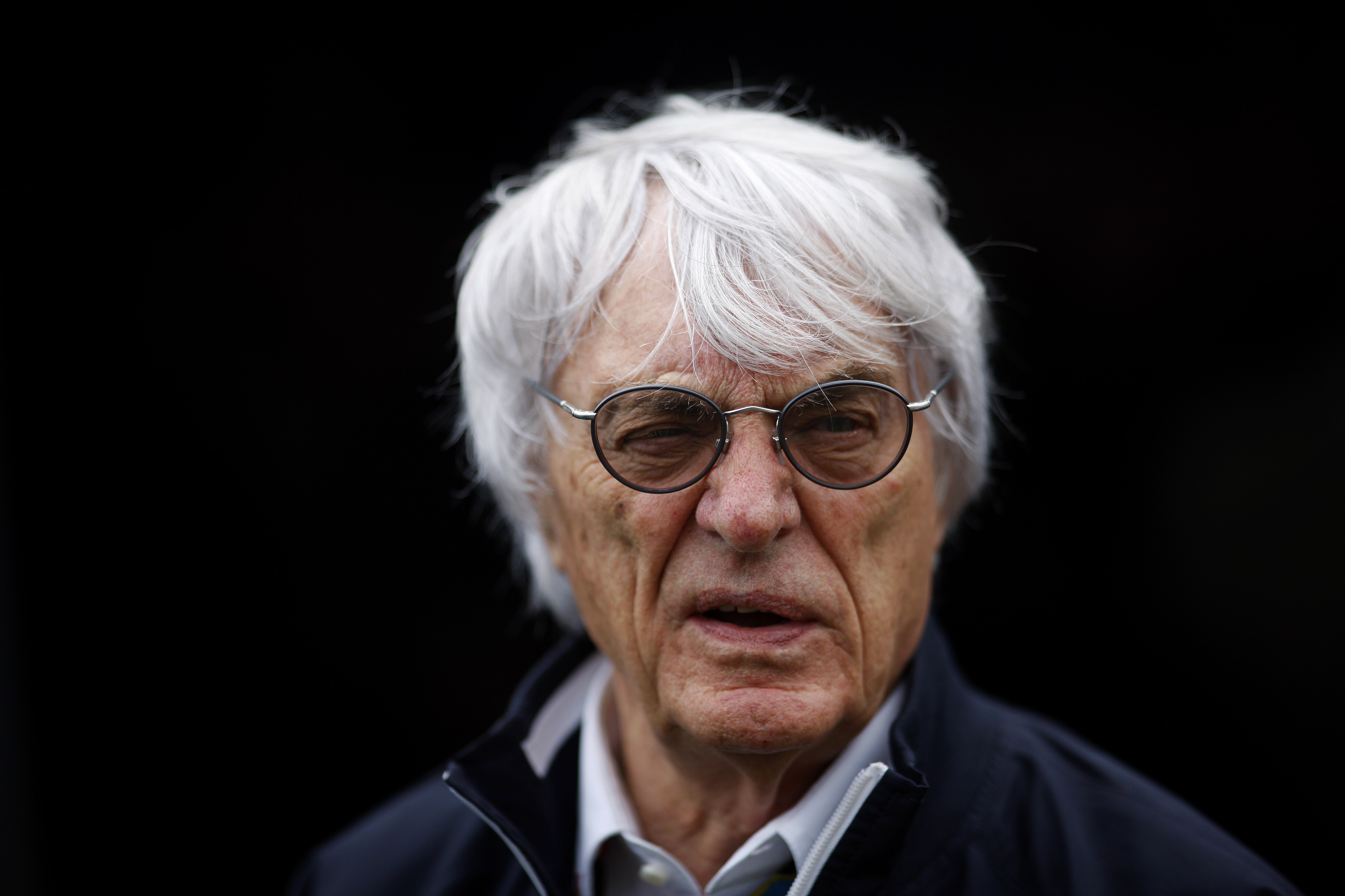 NORTHAMPTON, ENGLAND - JULY 05: F1 Supremo Bernie Ecclestone walks into the paddock for final practice ahead of the British Formula One Grand Prix at Silverstone Circuit on July 5, 2014 in Northampton, United Kingdom. (Photo by Drew Gibson/Getty Images)