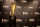 This Monday, July 14, 2014 photo shows the College Football Playoff National Championship Trophy in Irving, Texas. A rising gold football-shaped trophy will be the prize for the national champion in the new College Football Playoff. (AP Photo/Tony Gutierrez)