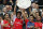 Arsenal's Mikel Olivier Giroud, left with teammate Alexis Sanchez hold up the English FA Community Shield after their team defeated Manchester City following the traditional season opening soccer match at Wembley Stadium, London Sunday, Aug. 10, 2014. Arsenal won the game 3-0. (AP Photo/Alastair Grant)
