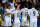 CARDIFF, WALES - AUGUST 12:  (L-R) Cristiano Ronaldo of Real Madrid celebrates with teammates James Rodriguez, Gareth Bale and Karim Benzema after scoring the opening goal during the UEFA Super Cup between Real Madrid and Sevilla FC at Cardiff City Stadium on August 12, 2014 in Cardiff, Wales.  (Photo by Clive Mason/Getty Images)