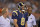 St. Louis Rams quarterback Sam Bradford (8) leaves the field after getting hit by Cleveland Browns defensive end Armonty Bryant in the first quarter of a preseason NFL football game Saturday, Aug. 23, 2014, in Cleveland. (AP Photo/David Richard)