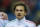 Italy's Alessio Cerci stands for his countries' national anthem during a friendly soccer match against Spain at the Vicente Calderon stadium in Madrid, Wednesday March 5, 2014. (AP Photo/Paul White)