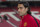 Manchester United's new player Radamel Falcao walks across the pitch at Old Trafford Stadium, Manchester, England, Thursday Sept. 11, 2014. The Colombian striker Falcao joined on a season-long loan deal from Ligue 1 side Monaco as Louis van Gaal looks to bolster his attacking options. (AP Photo/Jon Super)
