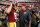 Washington Redskins quarterback Kirk Cousins (8) and head coach Jay Gruden talk after an NFL football game against the Jacksonville Jaguars Sunday, Sept. 14, 2014, in Landover, Md. The Redskins won 41-10. (AP Photo/Evan Vucci)