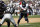 Houston Texans wide receiver Andre Johnson, right, carries the ball as Oakland Raiders defensive back Chimdi Chekwa, left, looks on in the first quarter of an NFL football game Sunday, Sept. 14, 2014, in Oakland, Calif. (AP Photo/Beck Diefenbach)