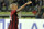 AC Milan's Nigel De Jong of the Netherlands celebrates after scoring during a Serie A soccer match against Parma, at Parma's Tardini stadium, Italy, Sunday, Sept. 14, 2014. (AP Photo/Marco Vasini)