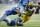 Detroit Lions outside linebacker DeAndre Levy (54) prepares to tackle Green Bay Packers running back Eddie Lacy (27) during the second half of an NFL football game in Detroit, Sunday, Sept. 21, 2014. (AP Photo/Rick Osentoski)