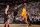 PHOENIX, AZ - JANUARY 30:  Kobe Bryant #24 of the Los Angeles Lakers goes for a jump shot against P.J. Tucker #17 of the Phoenix Suns during the game between the Los Angeles Lakers and the Phoenix Suns at US Airways Center on January 30, 2013 in Phoenix, Arizona. NOTE TO USER: User expressly acknowledges and agrees that, by downloading and/or using this Photograph, user is consenting to the terms and conditions of the Getty Images License Agreement. Mandatory Copyright Notice: Copyright 2013 NBAE (Photo by Andrew D. Bernstein/NBAE via Getty Images)