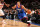 NEW YORK, NY - MARCH 10: Michael Carter-Williams #1 of the Philadelphia 76ers drives against the New York Knicks during a game at Madison Square Garden in New York City. NOTE TO USER: User expressly acknowledges and agrees that, by downloading and or using this photograph, User is consenting to the terms and conditions of the Getty Images License Agreement. Mandatory Copyright Notice: Copyright 2014 NBAE (Photo by Nathaniel S. Butler/NBAE via Getty Images)