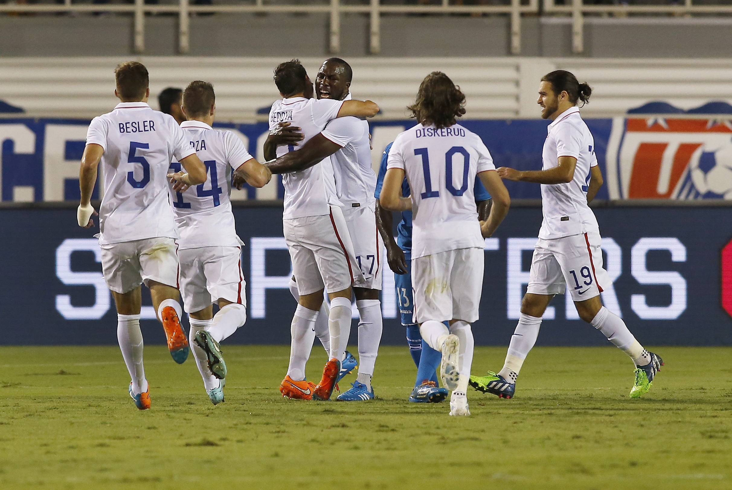 Oct 14, 2014; Boca Raton, FL, USA; USA forward Jozy Altidore (C) celebrates with teammates after scoring a goal in the first half against Honduras at FAU Stadium. Mandatory Credit: Robert Mayer-USA TODAY Sports