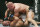 Georges St. Pierre fires off elbows at B.J. Penn during their title bout at UFC 94.