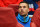 LONDON, ENGLAND - AUGUST 27: Lukas Podolski of Arsenal looks on from the substitutes bench before the UEFA Champions League Qualifier 2nd leg match between Arsenal and Besiktas at the Emirates Stadium on August 27, 2014 in London, United Kingdom.  (Photo by Shaun Botterill/Getty Images)