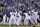 The Kansas City Royals players celebrate after the Royals defeated the Baltimore Orioles 2-1 in Game 4 of the American League baseball championship series Wednesday, Oct. 15, 2014, in Kansas City, Mo. The Royals advance to the World Series.
