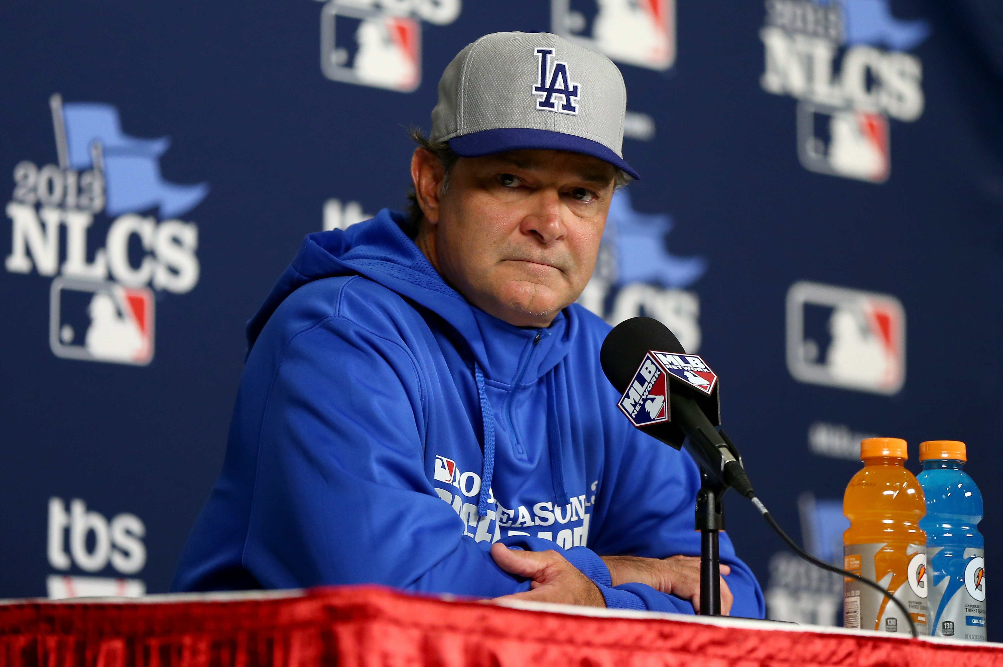 ST LOUIS, MO - OCTOBER 18: Manager Don Mattingly #8 of the Los Angeles Dodgers answers questions before Game Six of the National League Championship Series against the St. Louis Cardinals at Busch Stadium on October 18, 2013 in St Louis, Missouri. (Photo by Elsa/Getty Images)