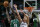 Brooklyn Nets forward Mason Plumlee (1) defends the basket against Boston Celtics forward Jeff Green (8) in the first quarter of an NBA basketball game in Boston, Wednesday, Oct. 29, 2014. (AP Photo/Elise Amendola)