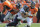 FILE - In this Sept. 23, 2012, file photo, Denver Broncos quarterback Peyton Manning (18) is sacked by Houston Texans defensive end J.J. Watt (99) as guard Manny Ramirez (65) tries to block Watt during an NFL football game in Denver. Watt's sacks have gone down from 20½ last season to 9½ this year, but the Broncos contend this is another case where the numbers don't tell the whole story. The two teams meet again on Sunday, Dec. 22. (AP Photo/Jack Dempsey, File)