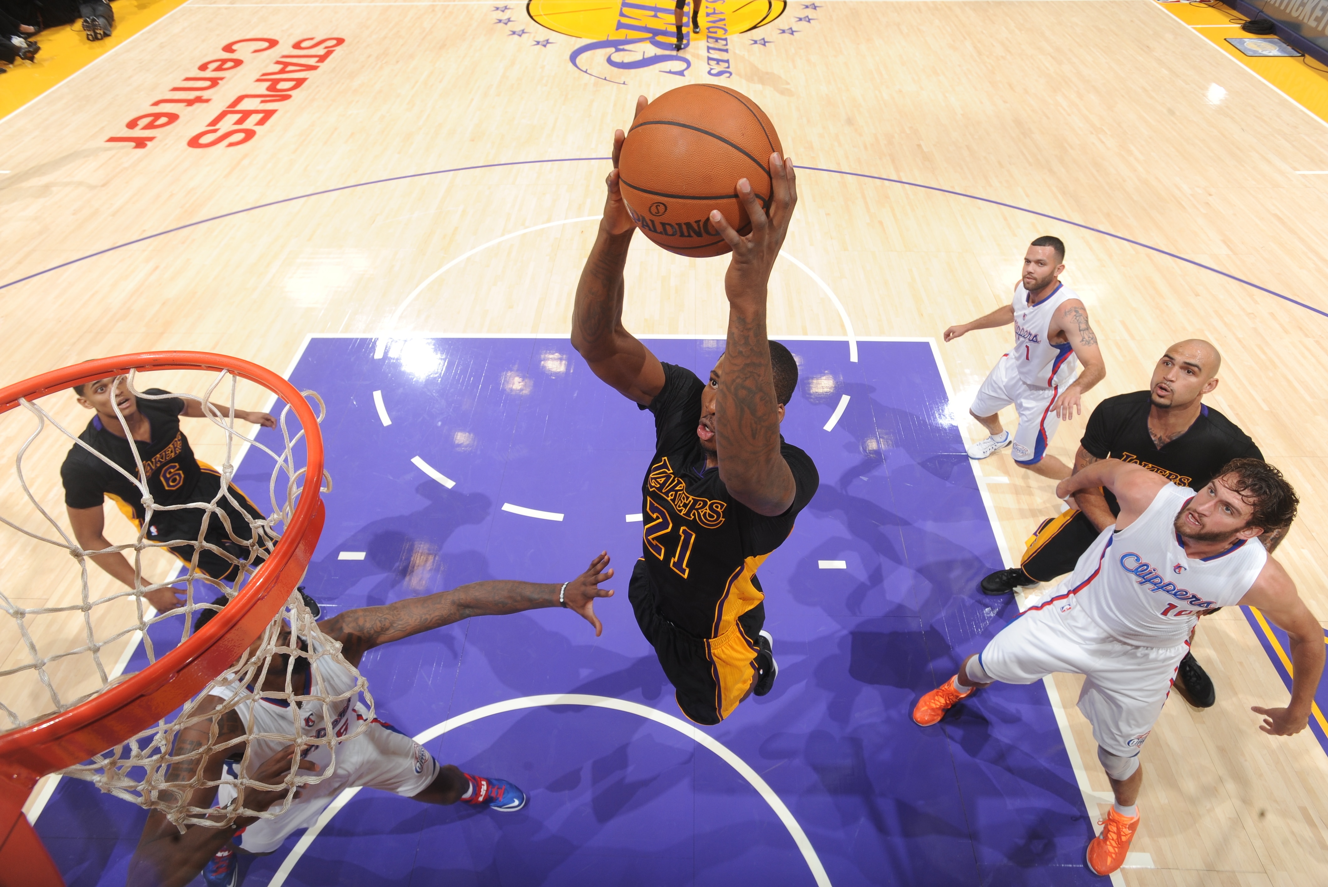 LOS ANGELES, CA - OCTOBER 31: Ed Davis #21 of the Los Angeles Lakers goes up for a dunk against the Los Angeles Clippers on October 31, 2014 at STAPLES Center in Los Angeles, California. NOTE TO USER: User expressly acknowledges and agrees that, by downloading and/or using this Photograph, user is consenting to the terms and conditions of Getty Images License Agreement. Mandatory Copyright Notice: Copyright 2014 NBAE (Photo by Andrew D. Bernstein/NBAE via Getty Images)
