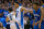 DURHAM, NC - NOVEMBER 14:  Tyus Jones #5 and Jahlil Okafor #15 of the Duke Blue Devils celebrate after Okafor's dunk against the Presbyterian Blue Hose during their game at Cameron Indoor Stadium on November 14, 2014 in Durham, North Carolina. Duke won 113-44.  (Photo by Grant Halverson/Getty Images)