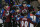 Clockwise from top left, Colorado Avalanche defenseman Nick Holden celebrates with center Nathan MacKinnon after his goal against the New York Islanders with defenseman Erik Johnson, left wing Gabriel Landeskog, of Sweden, and center Ryan O'Reilly in the second period of an NHL hockey game in Denver on Thursday, Oct. 30, 2014. (AP Photo/David Zalubowski)
