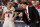 Nov 14, 2014; Tucson, AZ, USA; Arizona Wildcats guard T.J. McConnell (4) and Arizona Wildcats head coach Sean Miller talk during the second half against the Mount St. Mary's Mountaineers at McKale Center. Arizona won 78-55. Mandatory Credit: Casey Sapio-USA TODAY Sports