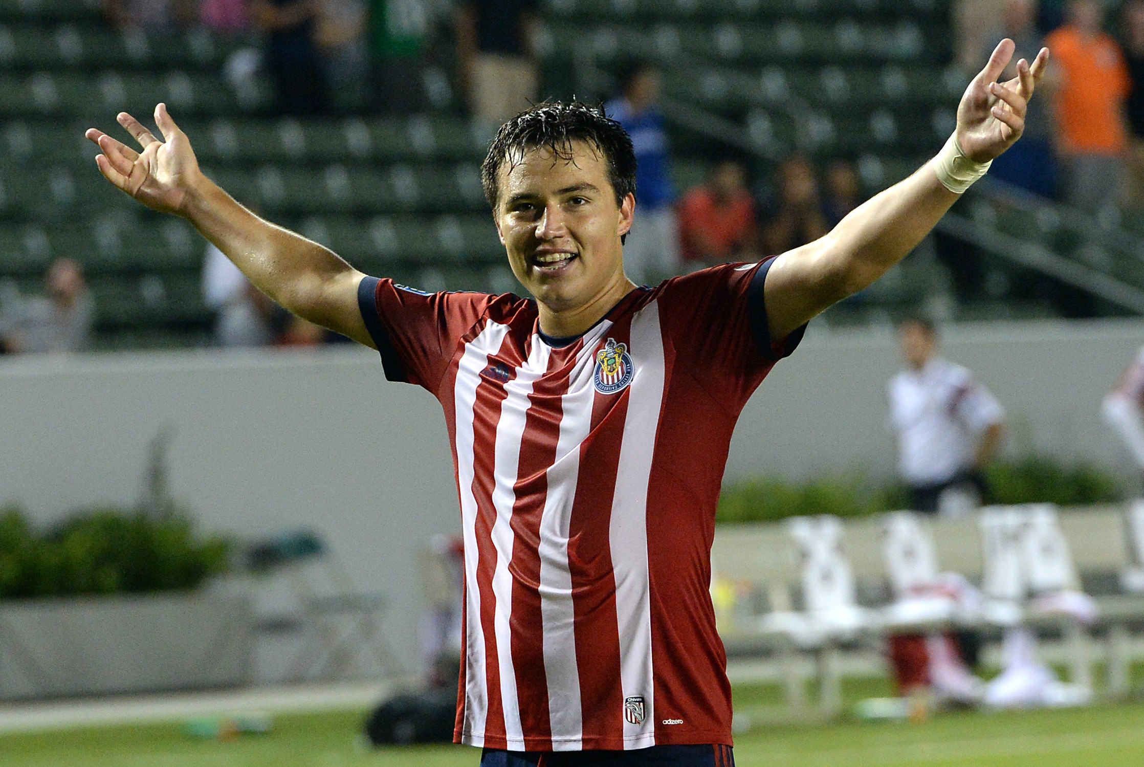 Jul 5, 2014; Carson, CA, USA; Chivas USA forward Erick Torres (9) raises his arms to the crowd celebrating his goal that won the game in extra time against the Montreal Impact at StubHub Center. Mandatory Credit: Jayne Kamin-Oncea-USA TODAY Sports
