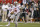 Ohio State's Braxton Miller (5) runs during the second half of a Big Ten Conference championship NCAA college football game against Michigan State Saturday, Dec. 7, 2013, in Indianapolis. (AP Photo/Michael Conroy)