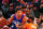 PHOENIX, AZ - JANUARY 2: Michael Carter-Williams #1 of the Philadelphia 76ers is guarded by Isaiah Thomas #3 of the Phoenix Suns on January 2, 2015 at U.S. Airways Center in Phoenix, Arizona. NOTE TO USER: User expressly acknowledges and agrees that, by downloading and or using this photograph, user is consenting to the terms and conditions of the Getty Images License Agreement. Mandatory Copyright Notice: Copyright 2015 NBAE (Photo by Barry Gossage/NBAE via Getty Images)