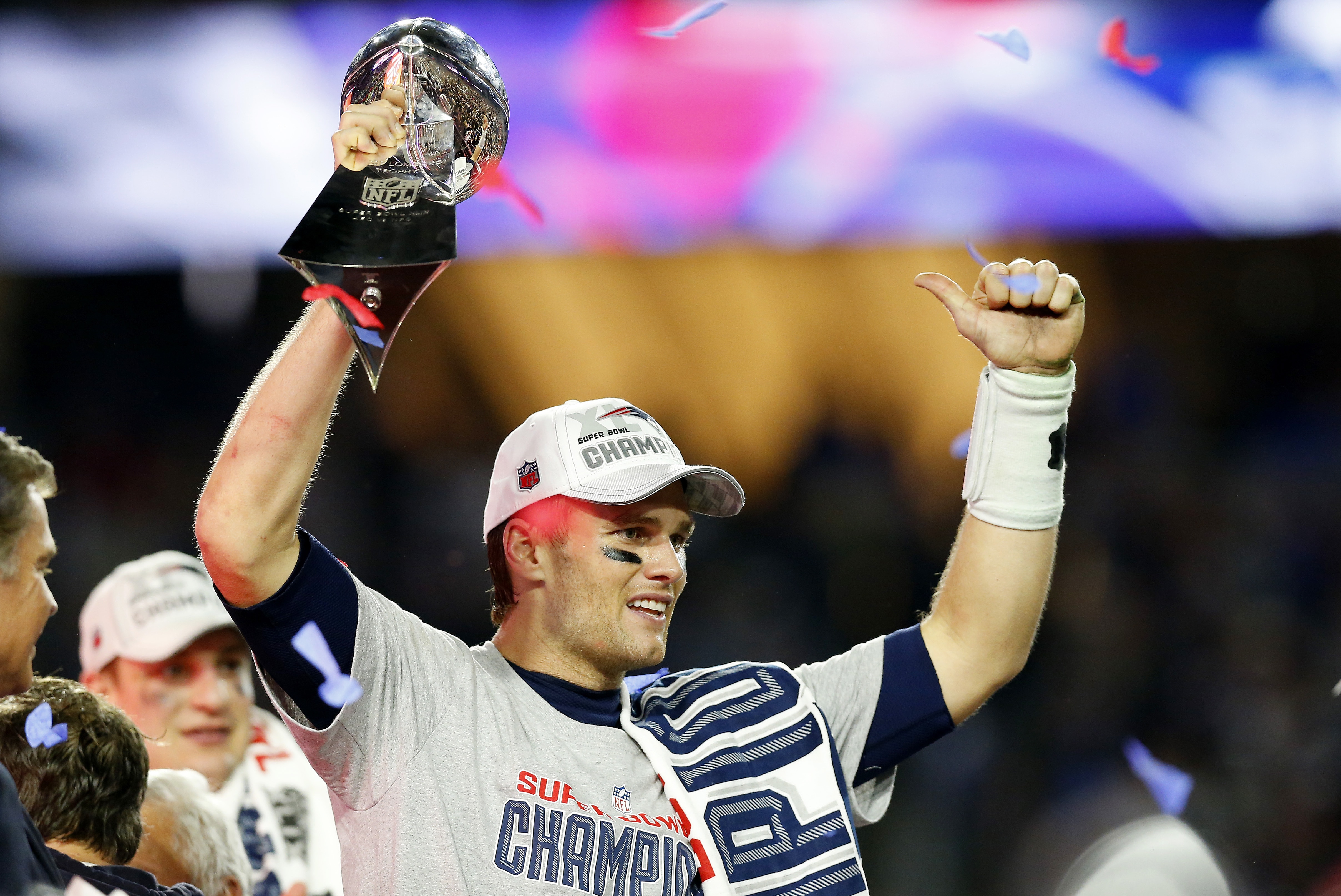 GLENDALE, AZ - FEBRUARY 01: Tom Brady #12 of the New England Patriots celebrates with the Vince Lombardi Trophy after defeating the Seattle Seahawks 28-24 to win Super Bowl XLIX at University of Phoenix Stadium on February 1, 2015 in Glendale, Arizona. (Photo by Tom Pennington/Getty Images)