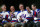 Buzz Schneider of the 1980 U.S. ice hockey team, second from right, speaks during a