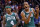 Boston Celtics' Isaiah Thomas (4) and Avery Bradley celebrate a basket against the Phoenix Suns  during the second half of an NBA basketball game Monday, Feb. 23, 2015, in Phoenix. (AP Photo/Matt York)