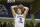 BYU guard Kyle Collinsworth (5) prepares to dunk the basketball in the first half of an NCAA college basketball game at the Maui Invitational on Wednesday, Nov. 26, 2014, in Lahaina, Hawaii. (AP Photo/Eugene Tanner)