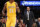 New York Knicks' head coach Derek Fisher directs his team against the Los Angeles Lakers including Lakers' Ed Davis, left, during an NBA Basketball game, Thursday, March 12, 2015, in Los Angeles. The Knicks won 101-94. (AP Photo/Danny Moloshok)