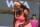 Serena Williams reacts after acing a serve to Monica Niculescu, of Romania, in a qualifying tennis match at the BNP Paribas Open tennis tournament, Tuesday, March 10, 2015, in Indian Wells, Calif. (AP Photo/Mark J. Terrill)