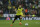 Dortmund's Nuri Sahin runs with the ball during a Champions League quarterfinal first leg soccer match between Real Madrid and Borussia Dortmund at the Santiago Bernabeu   stadium in Madrid, Spain, Wednesday April 2, 2014. (AP Photo/Paul White)