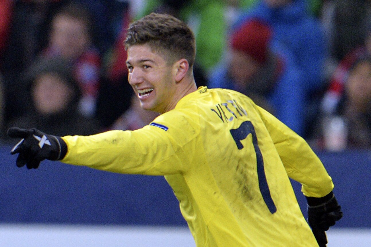 Villareal's Luciano Vietto celebrates after scoring during the Europa League Round 32 soccer match between FC Salzburg and Villareal FC in the Arena in Salzburg, Austria, Thursday, Feb. 26, 2015. (AP Photo/Kerstin Joensson)