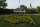 The sun rises over the Augusta National Golf Club house  before practice rounds for the Masters golf tournament Wednesday, April 4, 2012, in Augusta, Ga. (AP Photo/Darron Cummings)