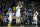 Apr 13, 2015; Oakland, CA, USA; Golden State Warriors guard Stephen Curry (30) gestures with three fingers as Golden State Warriors guard Klay Thompson (11) shoots and scores a three point basket against the Memphis Grizzlies during the second quarter at Oracle Arena. Mandatory Credit: Kelley L Cox-USA TODAY Sports