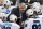 FILE - In this March 29, 2015, file photo, San Jose Sharks head coach Todd McLellan, center, talks to his team during a timeout in the third period of an NHL hockey game against the Pittsburgh Penguins in Pittsburgh.  The Sharks announced Monday, April 20. 2015, that they had agreed to part ways with McLellan, the winningest coach in franchise history after the team missed the playoffs for the first time since 2003.   (AP Photo/Gene J. Puskar, File)