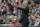 Arsenal manager Arsene Wenger shouts across the pitch during the English FA Cup semifinal soccer match between Arsenal and Reading at Wembley Stadium in London, Saturday, April 18, 2015. (AP Photo/Tim Ireland)