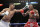 Amir Khan punches Devon Alexander during their welterweight bout Saturday, Dec. 13, 2014, in Las Vegas. (AP Photo/John Locher)