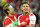 Arsenal's Olivier Giroud, right, with no playing substitute Arsenal's Nacho Monreal celebrate after the end of  the English FA Cup semifinal soccer match between Arsenal and Reading at Wembley stadium in London, Saturday, April 18, 2015.  Arsenal won the game 2-1 after extra time. (AP Photo/Alastair Grant)