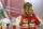 Ferrari driver Sebastian Vettel of Germany prepares in the pit prior to the start of the Bahrain Formula One Grand Prix at the Formula One Bahrain International Circuit in Sakhir, Bahrain, Sunday, April 19, 2015. (AP Photo/Luca Bruno)